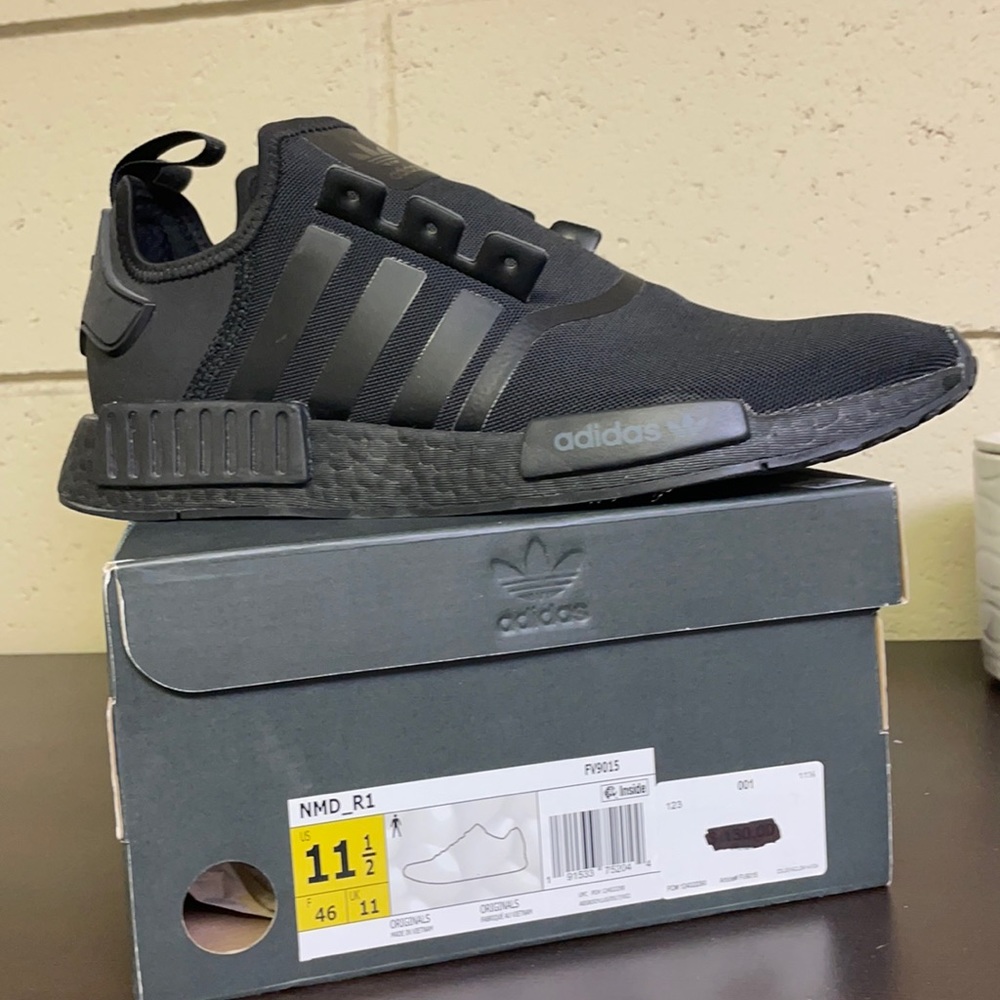 Brand new, never worn men’s size 11.5 Adidas NMD.